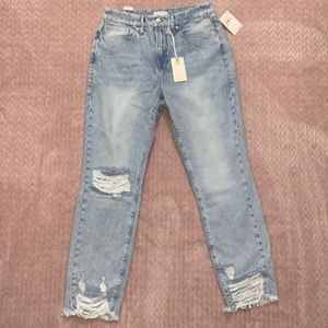 Good American Good Classic Light Wash Distressed Blue Jeans